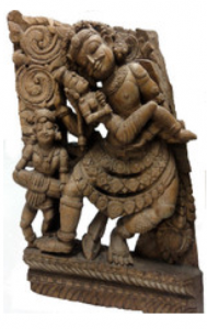 Shiva et Parvati dansant au son d'un musicien. Pièce de char cérémoniel Tamil Nadu - XVIIIe siècle Sculpture sur bois, 55 x 35,5 x 11 cm. Collection Michel Sabatier, La Rochelle